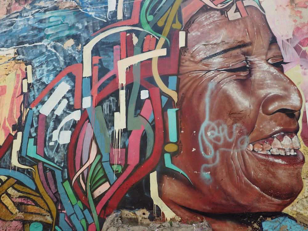 Getsemani street art - laughing woman