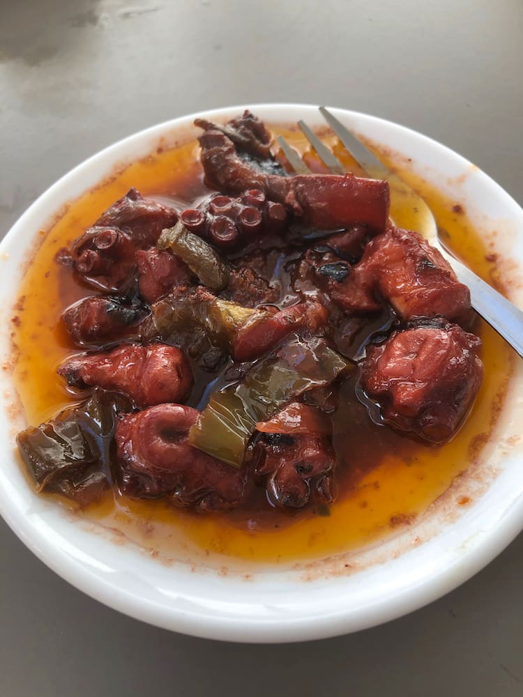 A plate with octopus and sauce