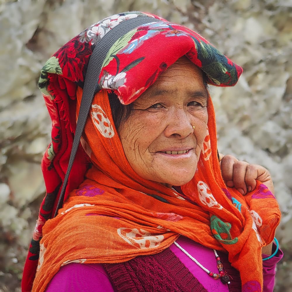 Portrait of a woman with an orange headscarf
